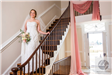 Bride on Stairs in Entryway